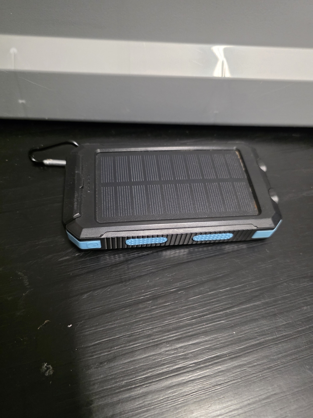 Portable Solar Power Bank - Black with Light Blue Accents